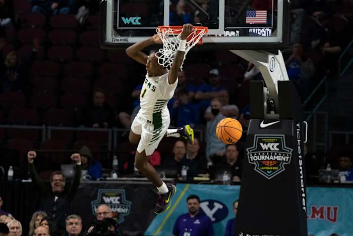 March 5, 2022; Las Vegas, NV, USA; San Francisco Dons guard Jamaree Bouyea (1) dunks the basketball against the Brigham Young Cougars during the second half in the quarterfinals of the WCC Basketball Championships at Orleans Arena.